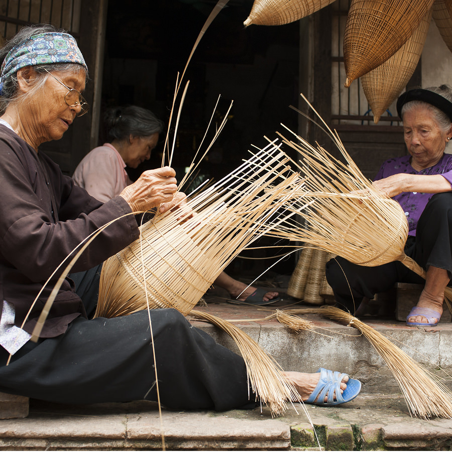Women with traditional handicraft in Vietnam 